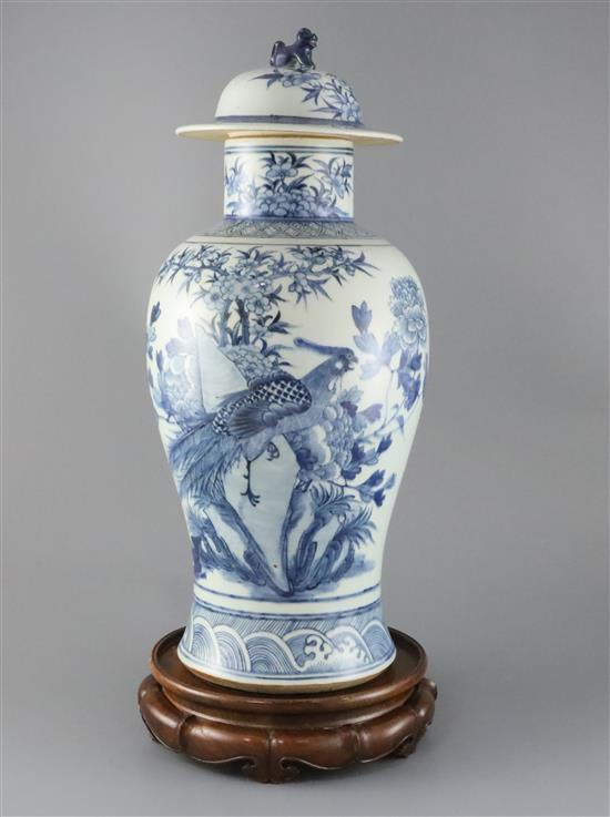 A large Chinese blue and white vase and cover, late 19th century, H.48cm, hardwood stand